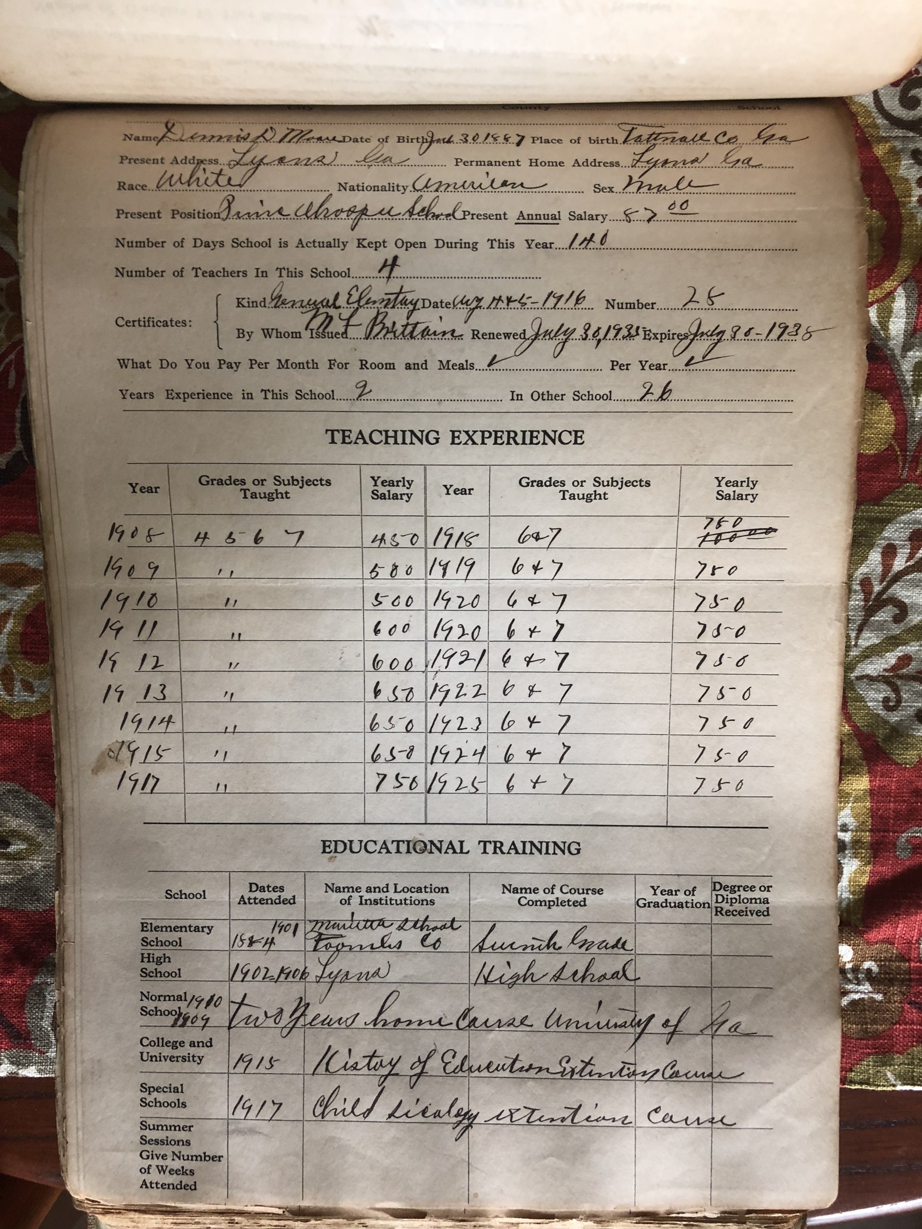 Dennis D. Moore’s teacher record, showing teaching experience and an educational-training table with a high-school attendance entry for 1902–1906. Open the larger image to examine the handwriting.