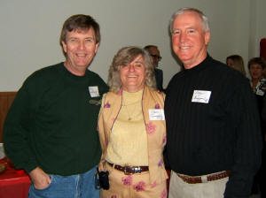 Billy Yarbrough (Class of '65), Pam Griggers (wife of Johnny), and Larry Griggers (Class of '66) are having a great time.
