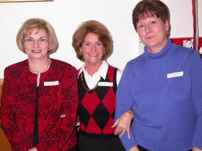 Mary Alice Krulic, Linda Brogdon and Pam Humphrey catch up on old friendships.