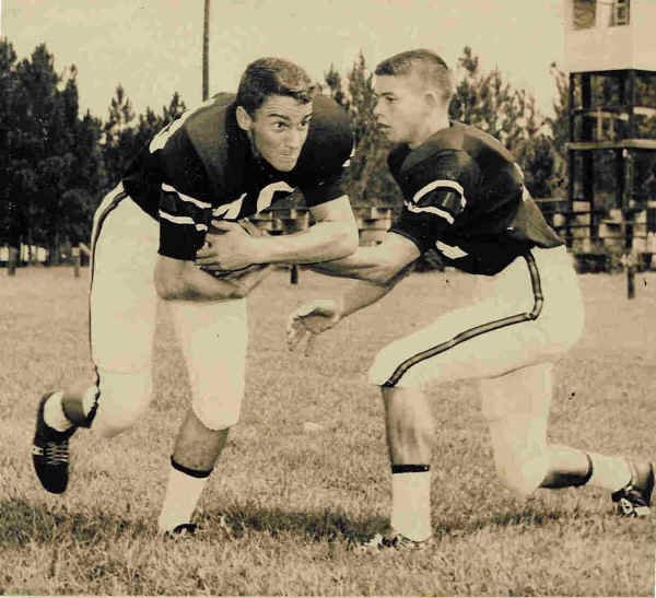 Jimmy Alexander handing off to James Powell