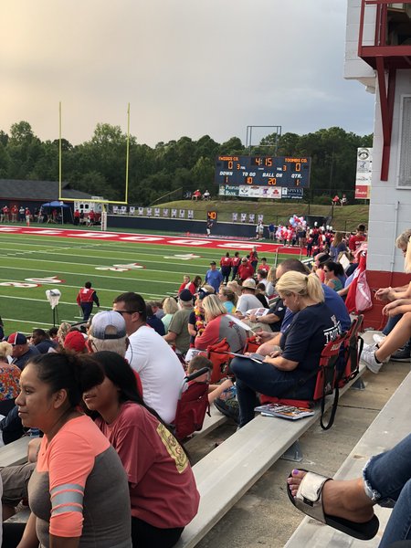 The fans, band, cheerleaders and players anxiously await the countdown for the inaugural kickoff.
