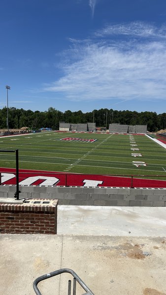 Two new field houses being built in the north end zone.